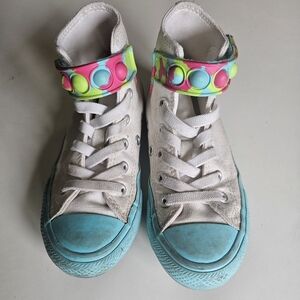 Converse Blue and Pink High-Top Sneakers with Colorful Accents.  Converse